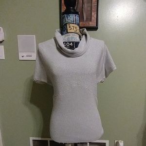 Women's short sleeve cow neck blouse.